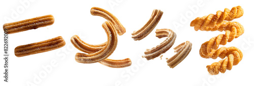 Close-up of various fried churros on white background