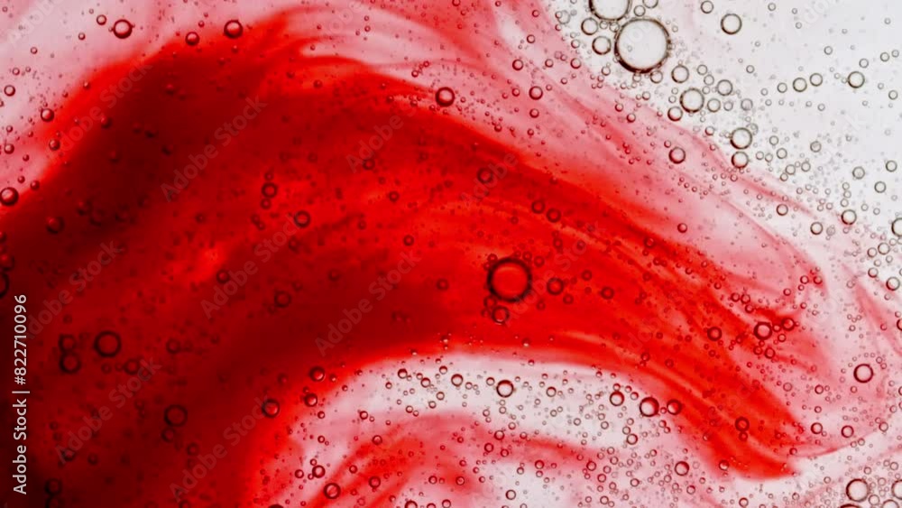 Transparent cosmetic gel fluid with molecule bubbles oil distribution on a white background. Macro Shot of Natural Organic Cosmetics, Medicine. Production Close-up. Slow Motion. High quality 4k Transparent cosmetic gel fluid with molecule bubbles oil distribution on a white background. Macro Shot of Natural Organic Cosmetics, Medicine. Production Close-up. Slow Motion. High quality 4k