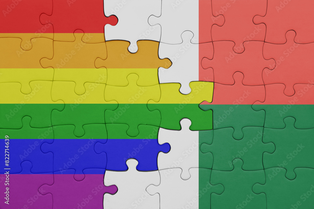 puzzle with the colourful national flag of madagascar and rainbow gay pride flag . puzzle with the colourful national flag of madagascar and rainbow gay pride flag .
