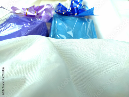 Blurred texturized background with gift present theme for design with copy space to add product. Template. Mockup
