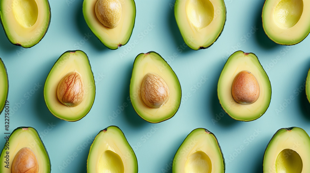 Artistic Flat Lay of Fresh Ripe Avocados on Pastel Blue Background, Symbolizing Simplicity and Diversity in Modern Photography Artistic Flat Lay of Fresh Ripe Avocados on Pastel Blue Background, Symbolizing Simplicity and Diversity in Modern Photography