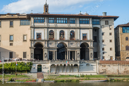 Facade of the Uffizi gallery in front of the Arno river, Florence ITALY photo