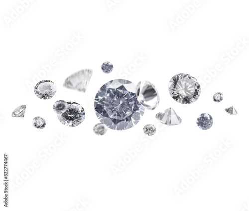 Beautiful shiny diamonds in air on white background