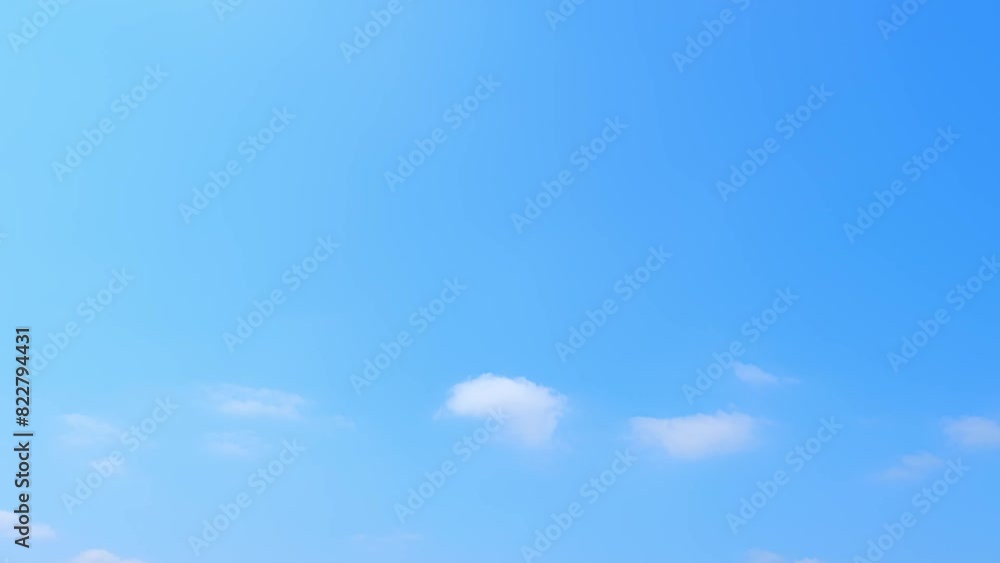 Layers of clouds glide through the sky in a sumptuous display of nature's elegance, revealed in a vivid time lapse that accentuates the beauty of the summer season. Timelapse. Sky background. 4K.
Layers of clouds glide through the sky in a sumptuous display of nature's elegance, revealed in a vivid time lapse that accentuates the beauty of the summer season. Timelapse. Sky background. 4K.