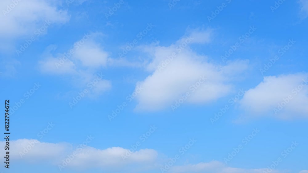 A white clouds moving swiftly across a serene blue sky in a time lapse video captures the essence of a relaxing, airy day. Sky cycles and air concept. Cinematic footage. Timelapse. Sky background.
A white clouds moving swiftly across a serene blue sky in a time lapse video captures the essence of a relaxing, airy day. Sky cycles and air concept. Cinematic footage. Timelapse. Sky background.