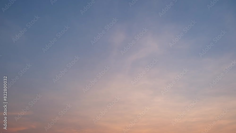 The sky transforms into a masterpiece of swirling clouds ablaze with the fiery palette of a setting sun in this stunning time-lapse. Horizon background. Natural cycles concept. Sunset timelapse. 4K.
The sky transforms into a masterpiece of swirling clouds ablaze with the fiery palette of a setting sun in this stunning time-lapse. Horizon background. Natural cycles concept. Sunset timelapse. 4K.
