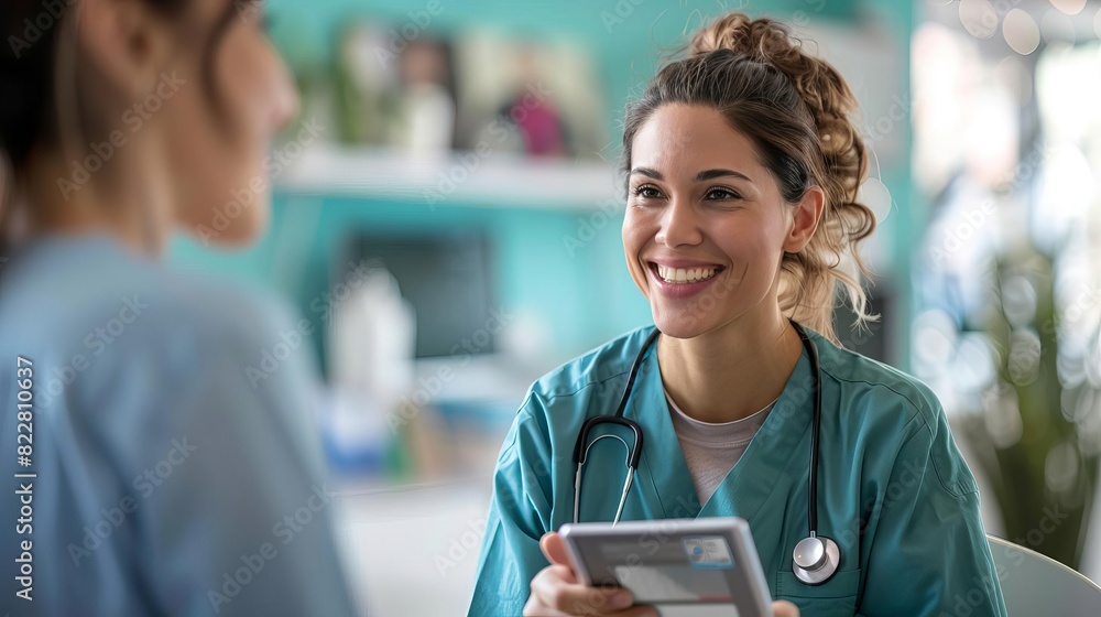Fototapeta premium A nurse assisting a patient in using a telemedicine app on a tablet,