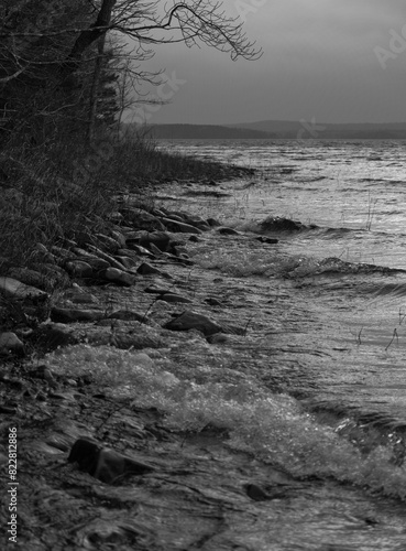 Waves Breaking Along Shore of Lake 