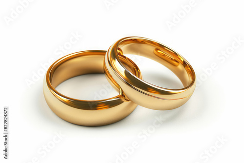 A pair of gold wedding rings are showcased in isolation on a white background, absent of shadow.