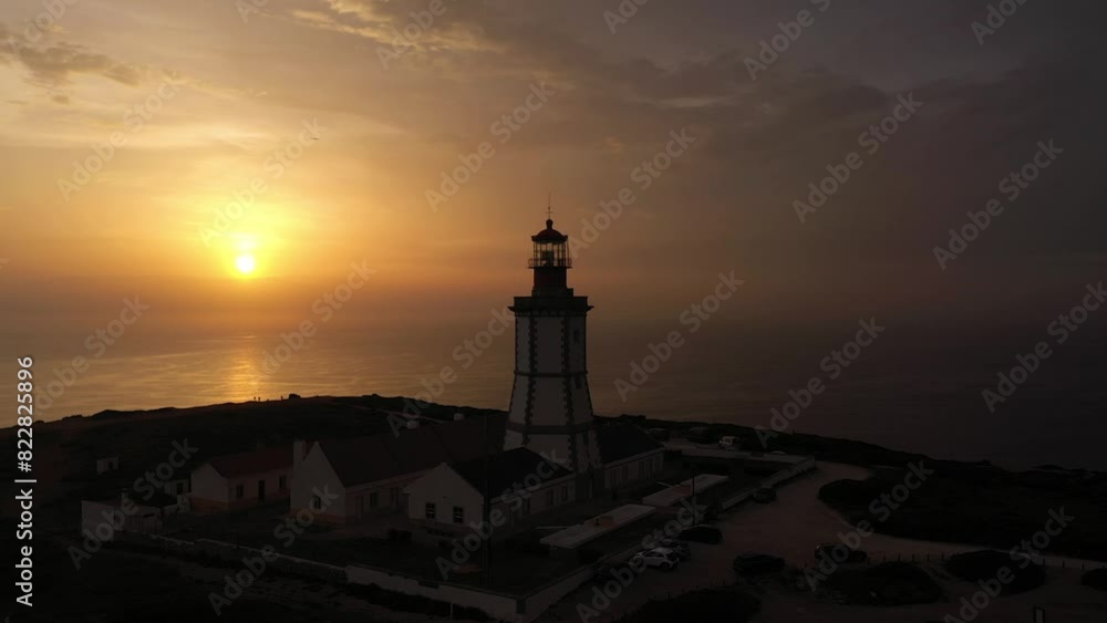 Lighthouse at Cabo Espichel at Sunset. Golden Hour. Portugal. Aerial View. Orbiting Lighthouse at Cabo Espichel at Sunset. Golden Hour. Portugal. Aerial View. Orbiting