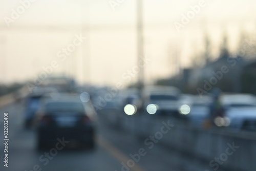 highway traffic with safety barrier on road asphalt, blurred image