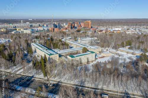 Aerial view of the Research Institutes of Novosibirsk Akademgorodok surrounded by forest in spring