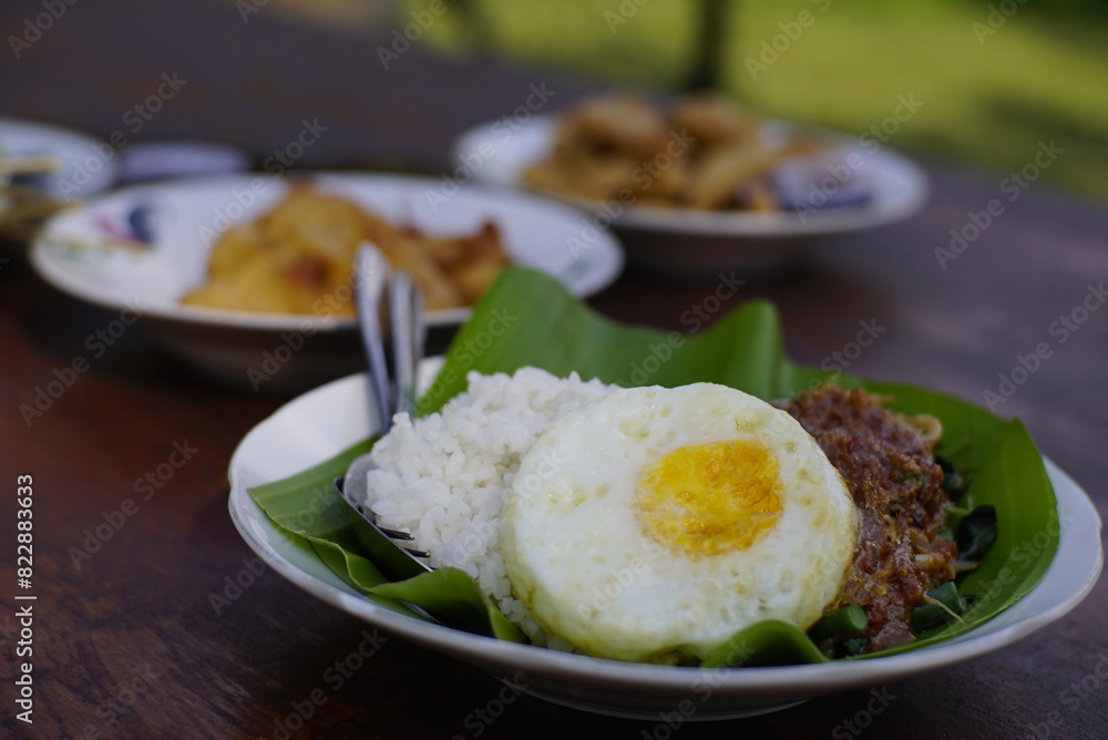 photography of fried egg and vegetable rice photography of fried egg and vegetable rice