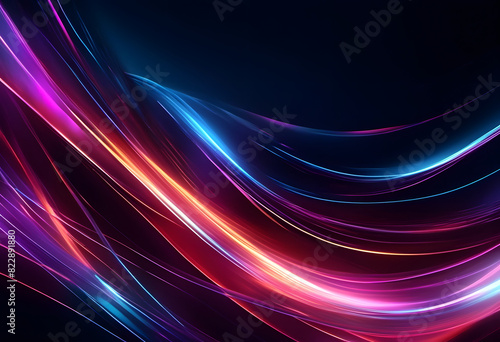 Abstract image featuring dynamic, colorful light trails against a dark background. The light trails are in shades of blue, pink, and red, creating a sense of motion and energy.