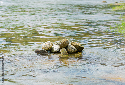 Stones placed on the surface of the stream