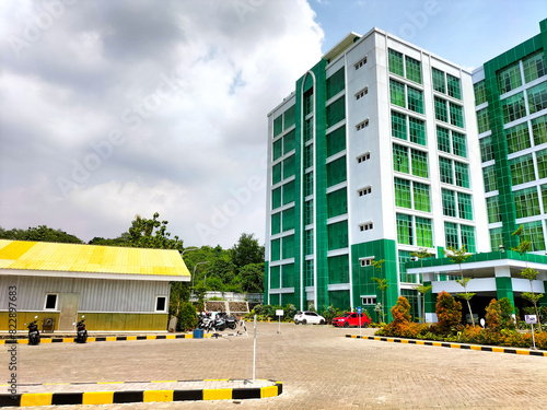 Selective focus. Faculty of Engineering Building at Semarang Muhammadiyah University (UNIMUS). Sky background. photo