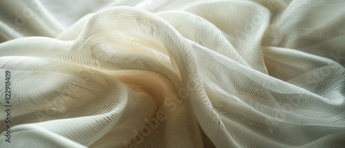 Soft color petals scattered on a luxurious white silk fabric background
