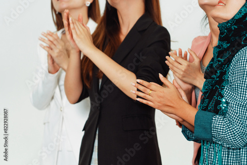 Business people applauding in a business meeting. Conference and presentation award concept. uds