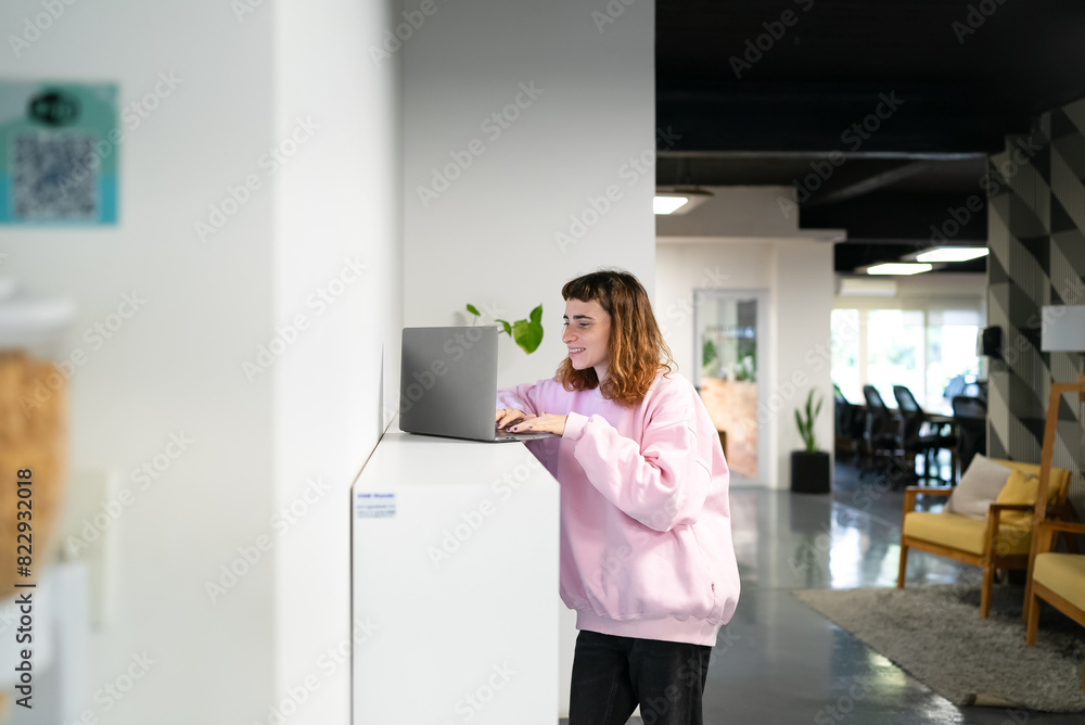 Businesswoman Using Computer in Modern Office. Stylish Beautiful Manager Smiling. Happy Beautiful Worker. Businesswoman Using Computer in Modern Office. Stylish Beautiful Manager Smiling. Happy Beautiful Worker.