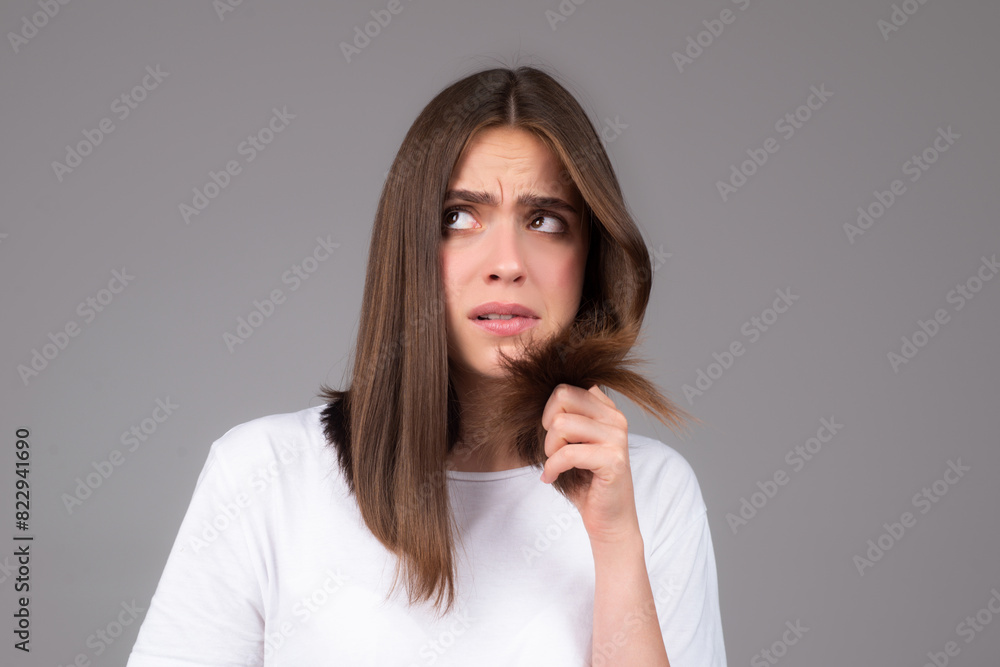 Girl with air loss problem treatment. Portrait of woman with a comb and problem hair. Girl with air loss problem treatment. Portrait of woman with a comb and problem hair.