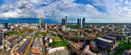 Wide panoramic image of Castlefield, Manchester showing  the Viaduct and the city downtown.  photo