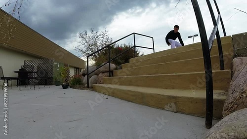 skateboarder does a back side heel flip