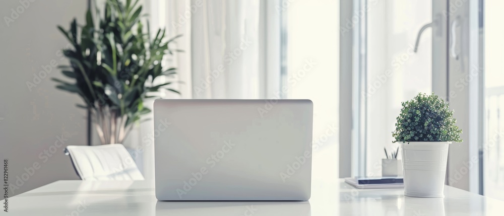 Minimalist office with a white desk and a sleek laptop, clean lines, easy on the eyes Minimalist office with a white desk and a sleek laptop, clean lines, easy on the eyes