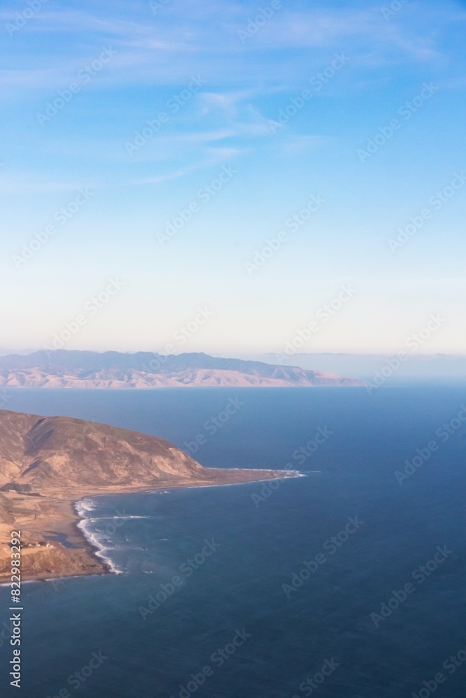 Aerial view of the Wainuiomata Coastline in the foreground with Cape Palliser in the background.