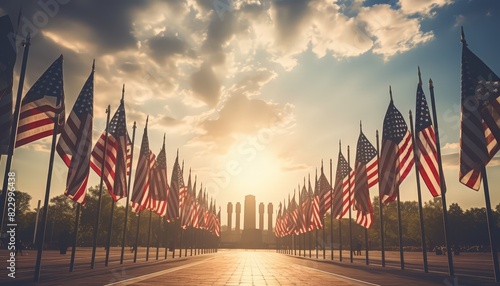 american flags waving at a national monument for memorial day photo
