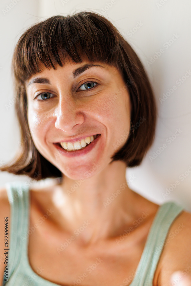 Close-up of a carefree laughing young woman. Portrait of a smiling young girl enjoying life. Close-up of a carefree laughing young woman. Portrait of a smiling young girl enjoying life.