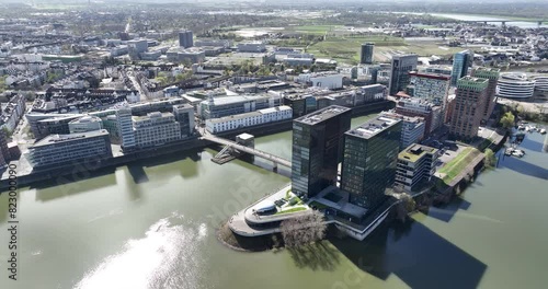 Old port of Dusseldorf, now the Medienhafen, old and modern new build buildings containing hotels, media, design and fashion companies. photo