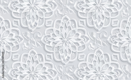 a white paper flower pattern on a gray background