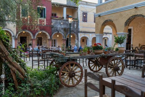 Fototapeta Naklejka Na Ścianę i Meble -  wooden cart on the old village street Greece Corfu
