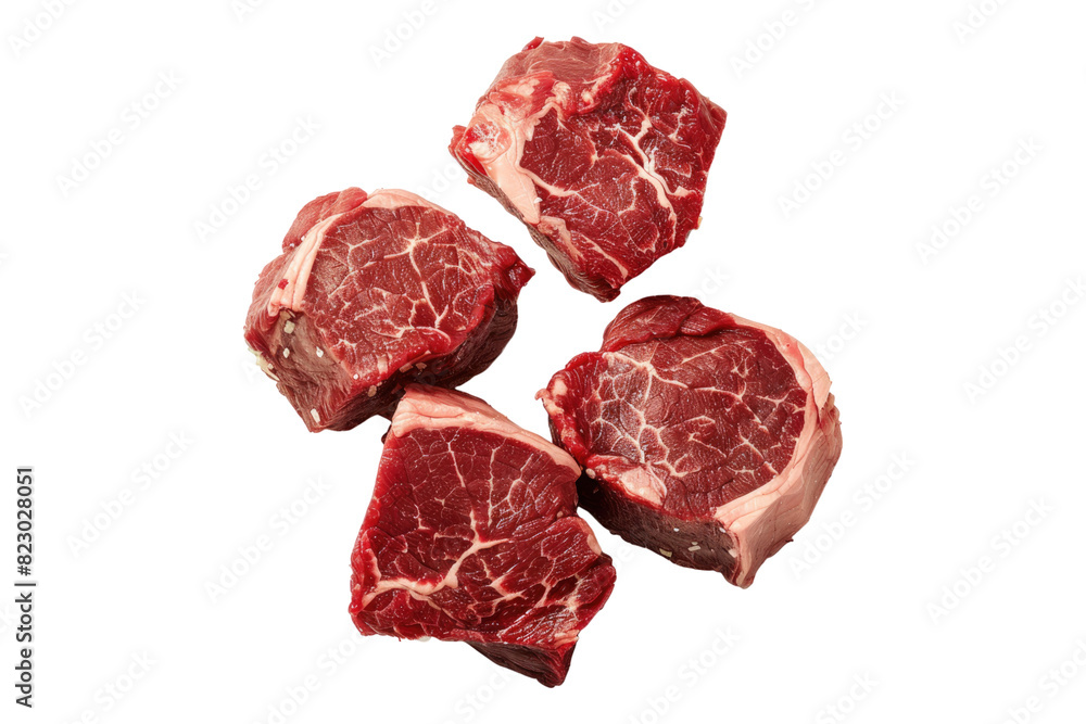 Pieces of raw beef cubes Isolated on white background Pieces of raw beef cubes Isolated on white background