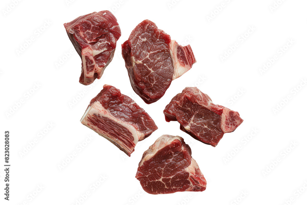 Pieces of raw beef cubes Isolated on white background Pieces of raw beef cubes Isolated on white background