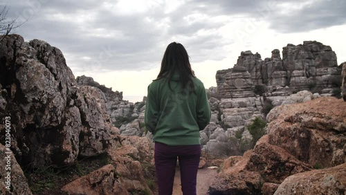 Woman in Torcal mountain, walking and wandering around, Antequera, Andalusia, Spain. High quality 4k footage