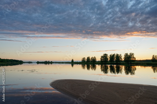Beautiful and serene summer evening at the sandy beach, Bothnian Bay, Finland