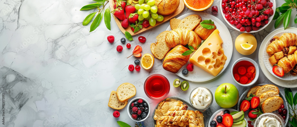 top view luxury mix colorful Fruits and snacks, desserts afternoon on table marble. banner copy space area top view luxury mix colorful Fruits and snacks, desserts afternoon on table marble. banner copy space area