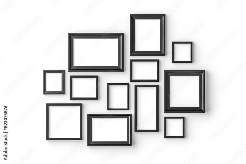 Modern wall arrangement of various sized black picture frames, ideal for contemporary interior design. Modern wall arrangement of various sized black picture frames, ideal for contemporary interior design.