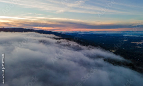 Sea of clouds around mountain peaks