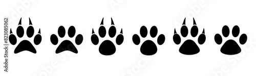 Dog and cat paw prints collection, paw icon set black vector.