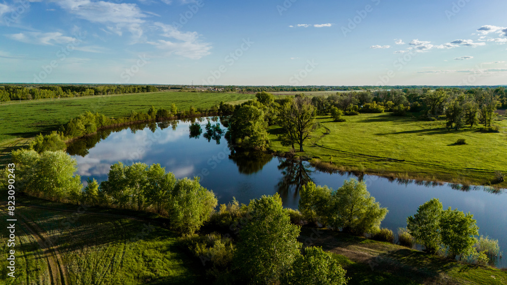 photo of the lake taken from a drone at sunset in May photo of the lake taken from a drone at sunset in May