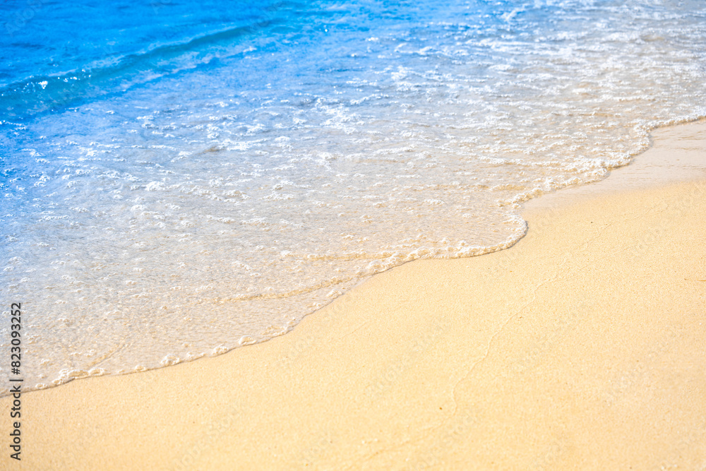 Nature of the beach and sea Summer with sunshine, sandy beaches, clear blue waters sparkling against the blue sky. On an island with good ecology and environment Background for summer vacation Nature of the beach and sea Summer with sunshine, sandy beaches, clear blue waters sparkling against the blue sky. On an island with good ecology and environment Background for summer vacation