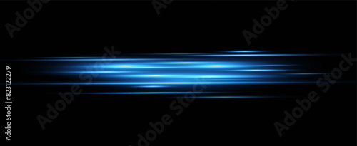 Neon blue horizontal speed lines. Glowing stripes. Laser beams. light lines of movement and speed in neon color.Beautiful flash of light and sparks.	