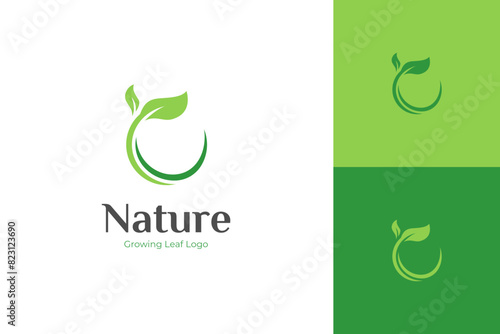 Nature growing leaf logo icon design, circle Earth with plant graphic element, symbol, sign for green Earth Day, nature globe and greening earth logo template