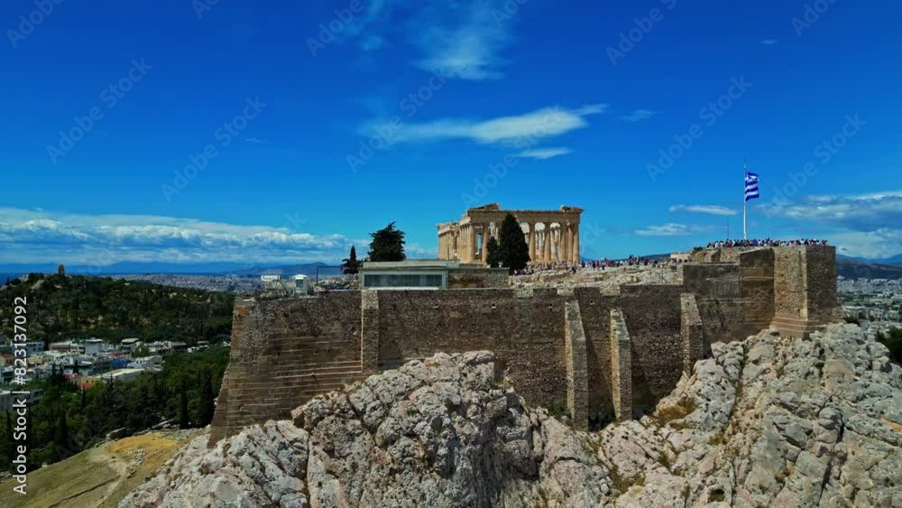 Parthenon monument on Acropolis mountain in Athens, Greece - rising, drone shot Parthenon monument on Acropolis mountain in Athens, Greece - rising, drone shot