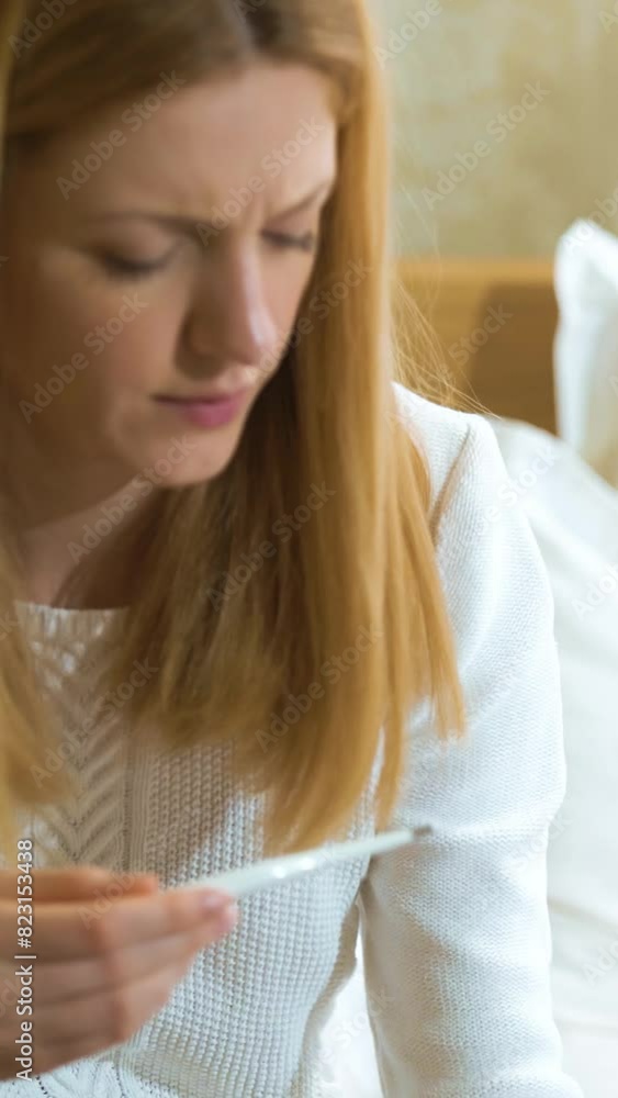 Woman is measure the temperature of little girl. Home quarantine coronavirus. Woman is measure the temperature of little girl. Home quarantine coronavirus.
