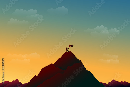 silhouette of a man holding a flag on a mountain peak in a twilight atmosphere