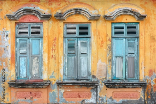 Reveling in Vintage Windows on a Weathered Exterior © Junaid