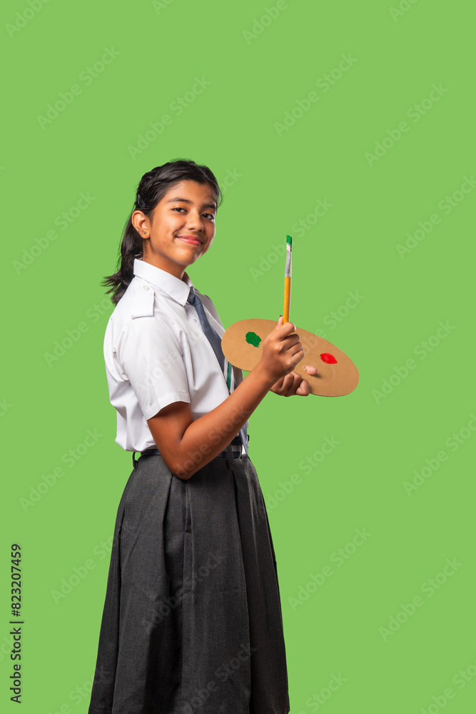 Indian asian schoolgirl in school uniform and career concept Indian asian schoolgirl in school uniform and career concept